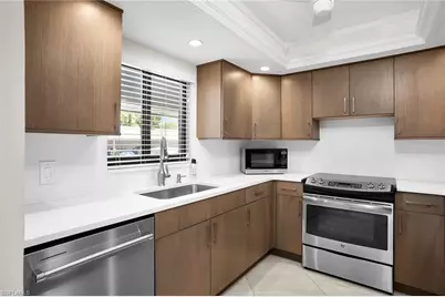 5773 Gage Ln #104B, Naples, FL 34113 - Photo 3