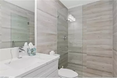7048 Pelican Bay Blvd #C-105, Naples, FL 34108 - Photo 13