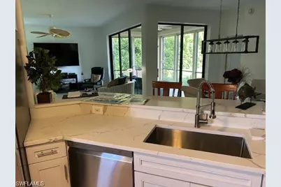 7048 Pelican Bay Blvd #C-105, Naples, FL 34108 - Photo 7