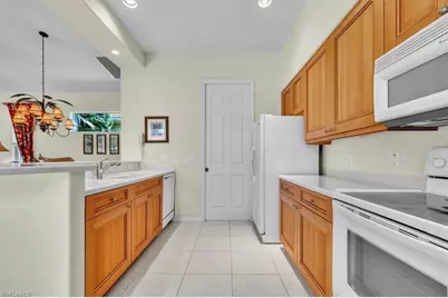 10879 Fieldfair Dr, Naples, FL 34119 - Photo 11