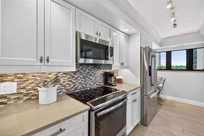 6020 Pelican Bay Blvd #402, Naples, FL 34108 - Photo 11