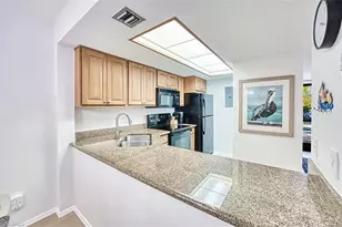 600 Neapolitan Way, Naples, FL 34103 - Photo 11
