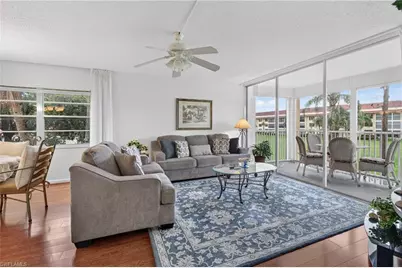 1087 Forest Lakes Dr #201, Naples, FL 34105 - Photo 1