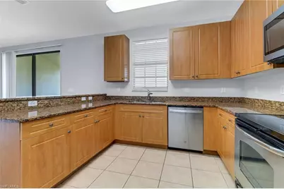 15243 Summit Place Cir #247, Naples, FL 34119 - Photo 9