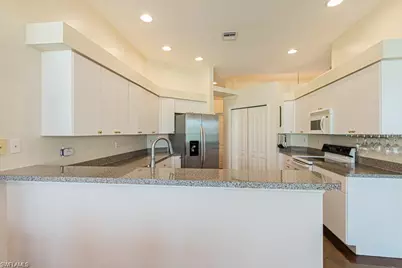 2252 Heritage Greens Dr, Naples, FL 34119 - Photo 15