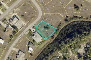 547 Bourse Cir, Lehigh Acres, FL 33974 - Photo 1