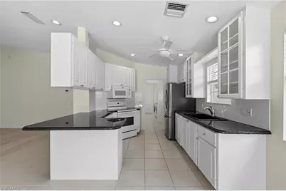 4954 Kingston Way, Naples, FL 34119 - Photo 17