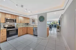 12945 Vanderbilt Dr, Naples, FL 34110 - Photo 7