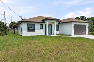 831 Bently St E, Lehigh Acres, FL 33974 - Photo 5