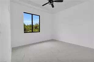 831 Bently St E, Lehigh Acres, FL 33974 - Photo 31