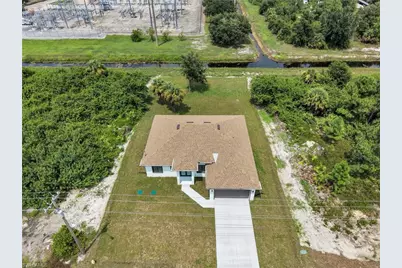 831 Bently St E, Lehigh Acres, FL 33974 - Photo 7