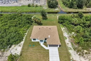 831 Bently St E, Lehigh Acres, FL 33974 - Photo 7