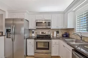 4318 27th Ct SW, Naples, FL 34116 - Photo 9