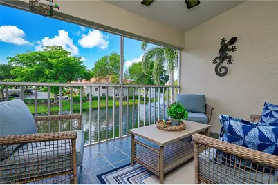 2460 Old Groves Rd #E-201, Naples, FL 34109 - Photo 1