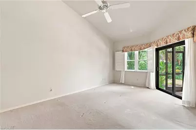 27067 Kindlewood Ln, Bonita Springs, FL 34134 - Photo 13