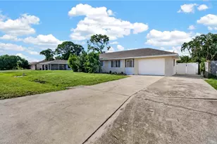 9197 Pomelo Rd E, Fort Myers, FL 33967 - Photo 1