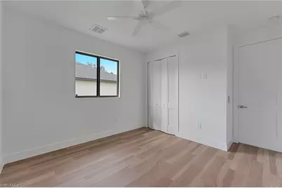 717 Theodore Vail St E, Lehigh Acres, FL 33974 - Photo 13
