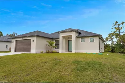 717 Theodore Vail St E, Lehigh Acres, FL 33974 - Photo 1