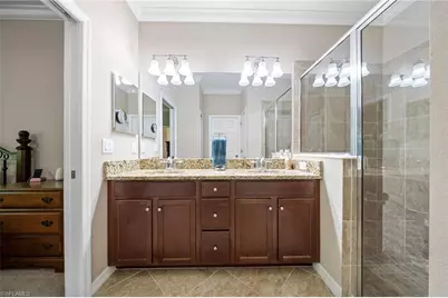 9086 Woodhurst Dr, Naples, FL 34120 - Photo 15
