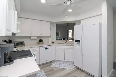 25080 Peacock Ln #101, Naples, FL 34114 - Photo 19
