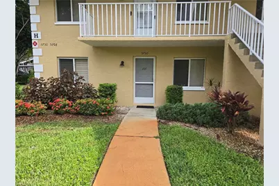 5750 Woodmere Lake Cir #H101, Naples, FL 34112 - Photo 1