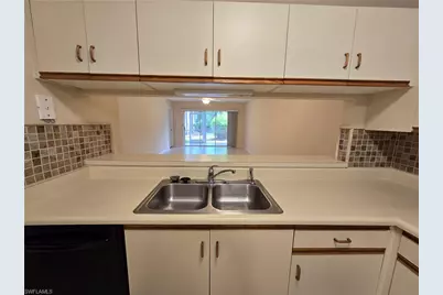 5750 Woodmere Lake Cir #H101, Naples, FL 34112 - Photo 11