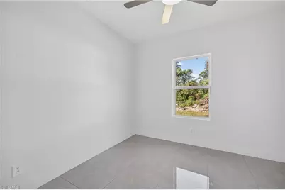 820 Dudley Ave S, Lehigh Acres, FL 33974 - Photo 25