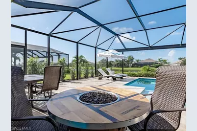 9392 Copper Rock Ct, Naples, FL 34120 - Photo 7