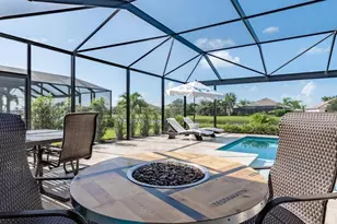 9392 Copper Rock Ct, Naples, FL 34120 - Photo 7