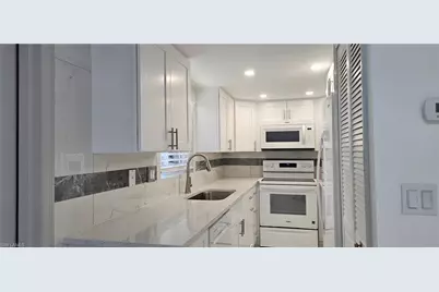 1251 7th Ave N #303, Naples, FL 34102 - Photo 5