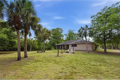 5681 Bur Oaks Ln, Naples, FL 34119 - Photo 11