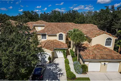 56 Silver Oaks Cir #202, Naples, FL 34119 - Photo 1