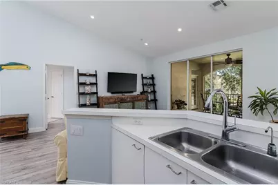 56 Silver Oaks Cir #202, Naples, FL 34119 - Photo 11