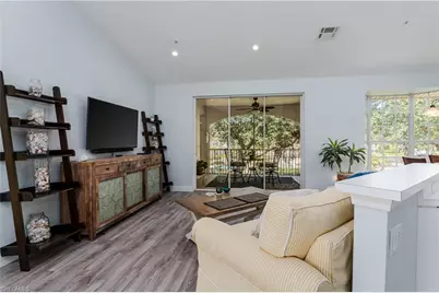 56 Silver Oaks Cir #202, Naples, FL 34119 - Photo 5