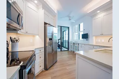 7040 Pelican Bay Blvd #D302, Naples, FL 34108 - Photo 3