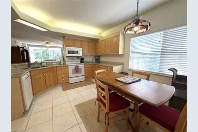 6816 Satinleaf Rd S #104, Naples, FL 34109 - Photo 9