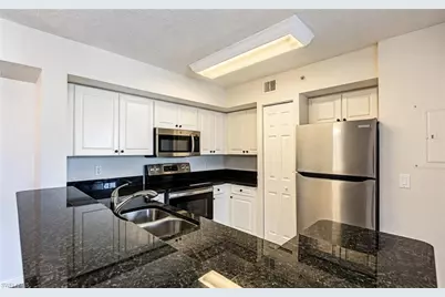 1180 Wildwood Lakes Blvd #105, Naples, FL 34104 - Photo 5