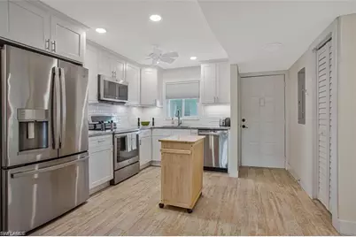 4298 27th Ct SW #101, Naples, FL 34116 - Photo 1