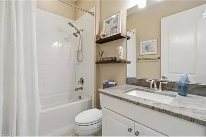 8665 Dilillo Ct, Naples, FL 34119 - Photo 21