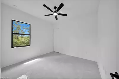 453 Spring Ave S, Lehigh Acres, FL 33974 - Photo 33