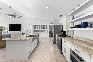 2467 Pinewoods Cir, Naples, FL 34105 - Photo 21