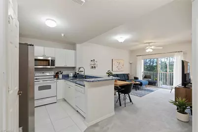 4450 Botanical Place Cir #303, Naples, FL 34112 - Photo 13