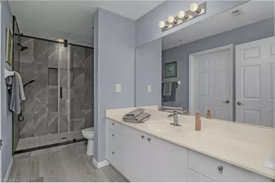 4450 Botanical Place Cir #406, Naples, FL 34112 - Photo 21