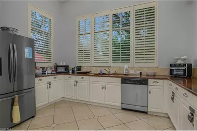 4450 Botanical Place Cir #406, Naples, FL 34112 - Photo 35