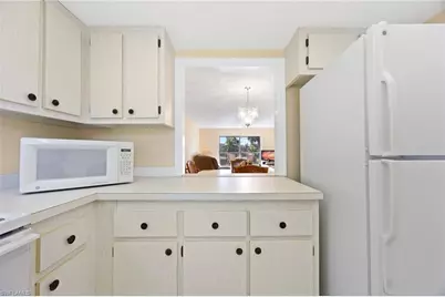 5683 Rattlesnake Hammock Rd #A-202, Naples, FL 34113 - Photo 5