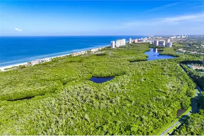 7024 Pelican Bay Blvd #201, Naples, FL 34108 - Photo 33