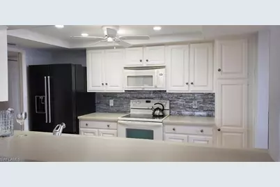 15 Bluebill Ave #406, Naples, FL 34108 - Photo 5