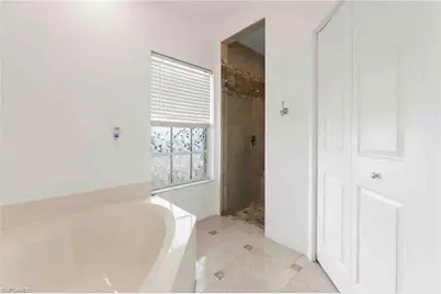 28910 Winthrop Cir, Bonita Springs, FL 34134 - Photo 21