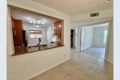 661 Squire Cir #101, Naples, FL 34104 - Photo 17
