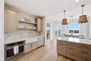 7687 Pebble Creek Cir, Naples, FL 34108 - Photo 9
